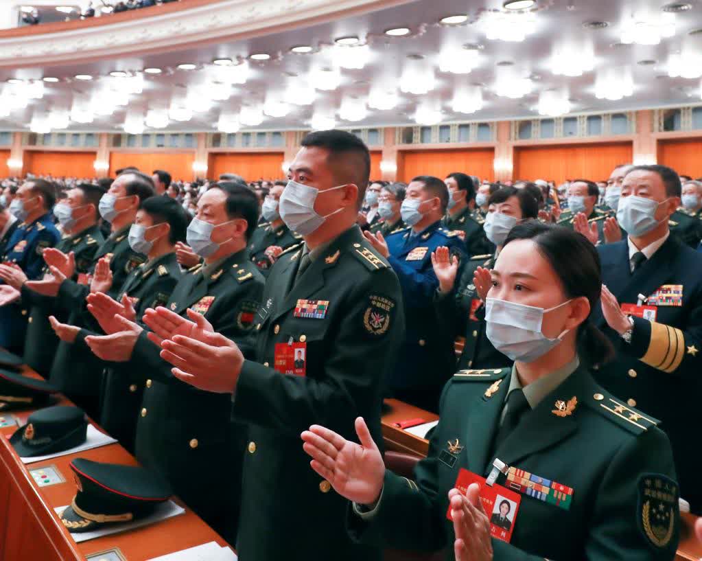 3月10日，十四屆全國人大一次會議在北京人民大會堂舉行第三次全體會議。（新華社記者丁林攝）