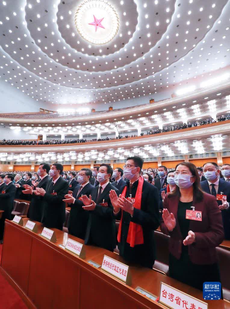 3月11日，十四屆全國人大一次會議在北京人民大會堂舉行第四次全體會議。（新華社記者丁林攝）