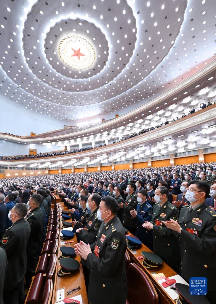 3月11日，十四屆全國人大一次會議在北京人民大會堂舉行第四次全體會議。（新華社記者饒愛民攝）