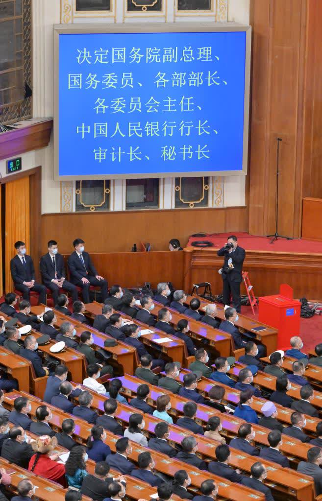 3月12日，十四屆全國人大一次會議在北京人民大會堂舉行第五次全體會議。（新華社）
