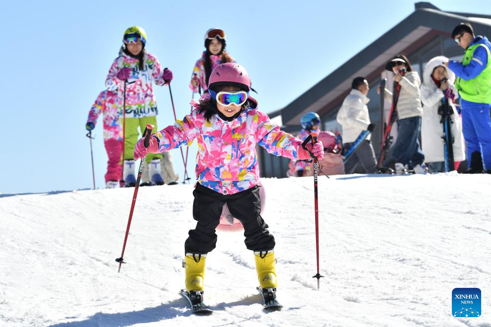People ski at a ski resort in Xingyang City, central China's Hubei Province, Dec. 28, 2025. (Photo by Yang Tao/Xinhua)