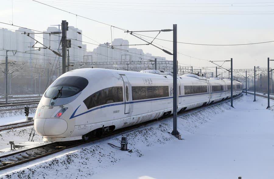 The bullet train No G1276, the first themed high-speed train of the Harbin Ice-Snow World, departs from Harbin West Station in Harbin, Northeast China's Heilongjiang province, Jan 4, 2026. [Photo/Xinhua]