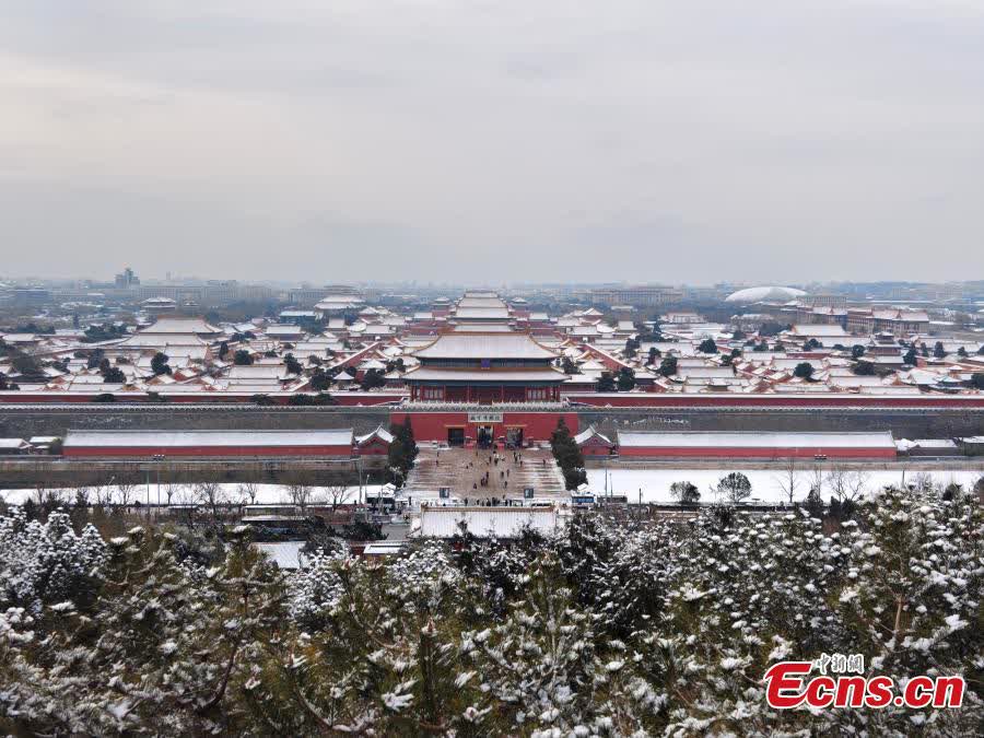 An aerial view taken on Jan. 17, 2026 shows snow-covered palaces at the Forbidden City in Beijing. (Photo/VCG)

Beijing saw its first snowfall of the year Saturday, with snow continuing across many areas into Sunday morning.
