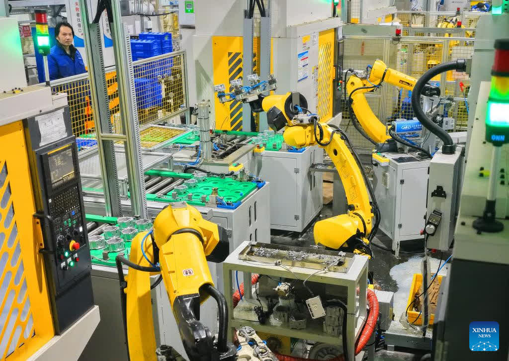 A drone photo taken on Jan. 29, 2026 shows a worker operating on a production line of a company in Hengdong County, Hengyang City of central China's Hunan Province. Enterprises across the country are going full steam ahead in production at the end of January, striving for a strong start in the first month of a new year. (Photo by Cao Zhengping/Xinhua)