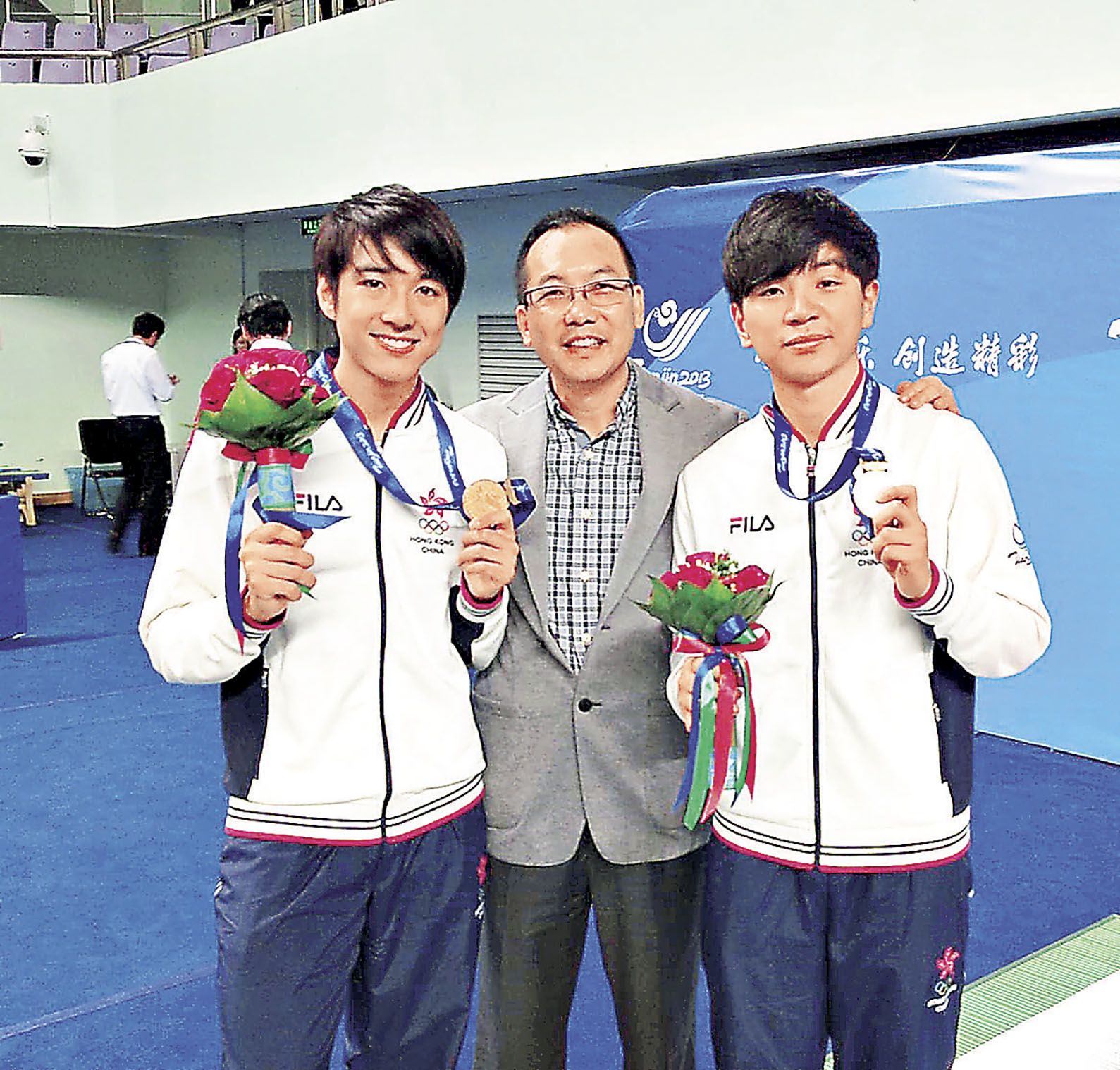 ■港隊劍擊代表崔浩然（左）及楊子加皆是黃贊的得意弟子。