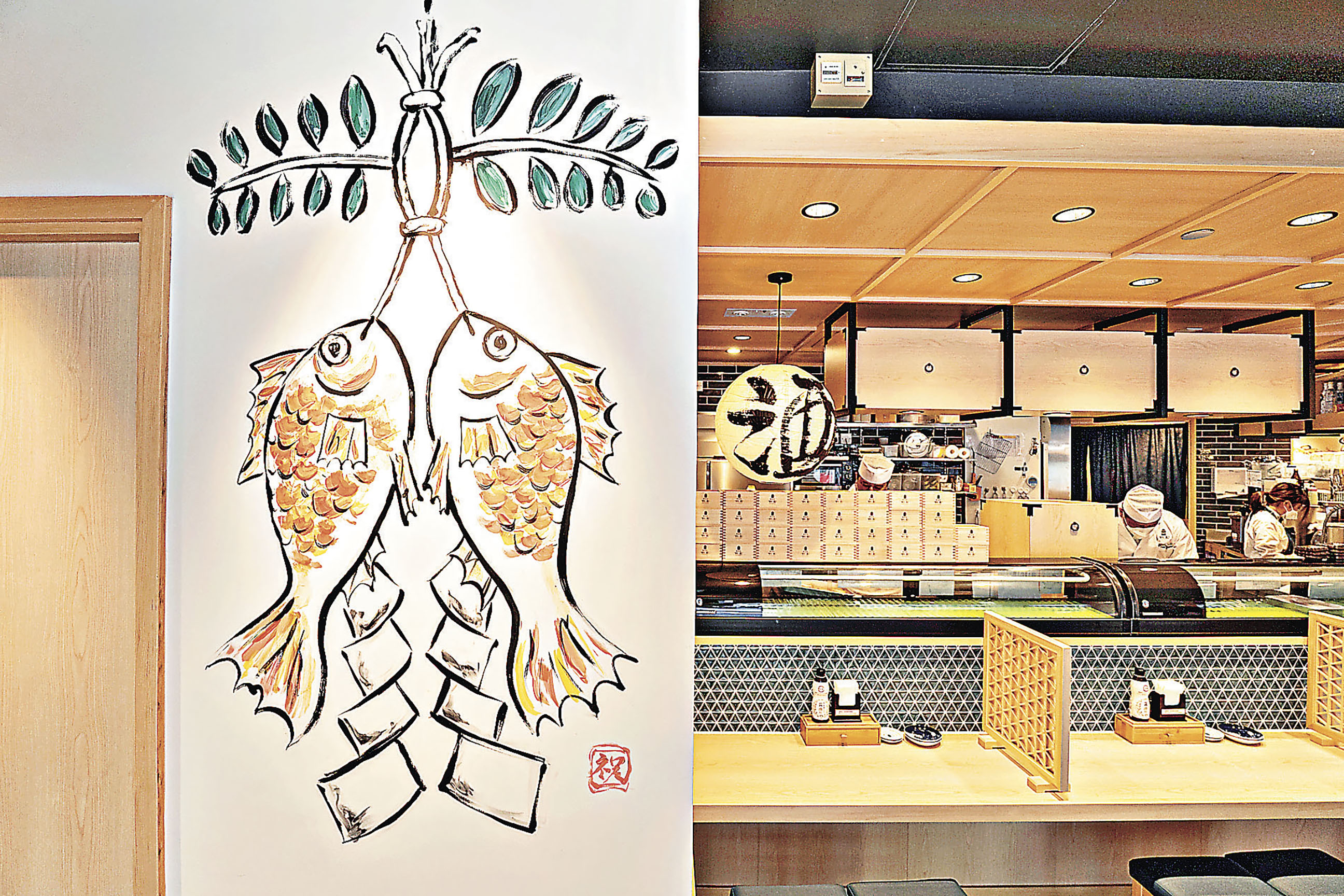 ■以東瀛畫風創作充滿本地特色的壁畫。