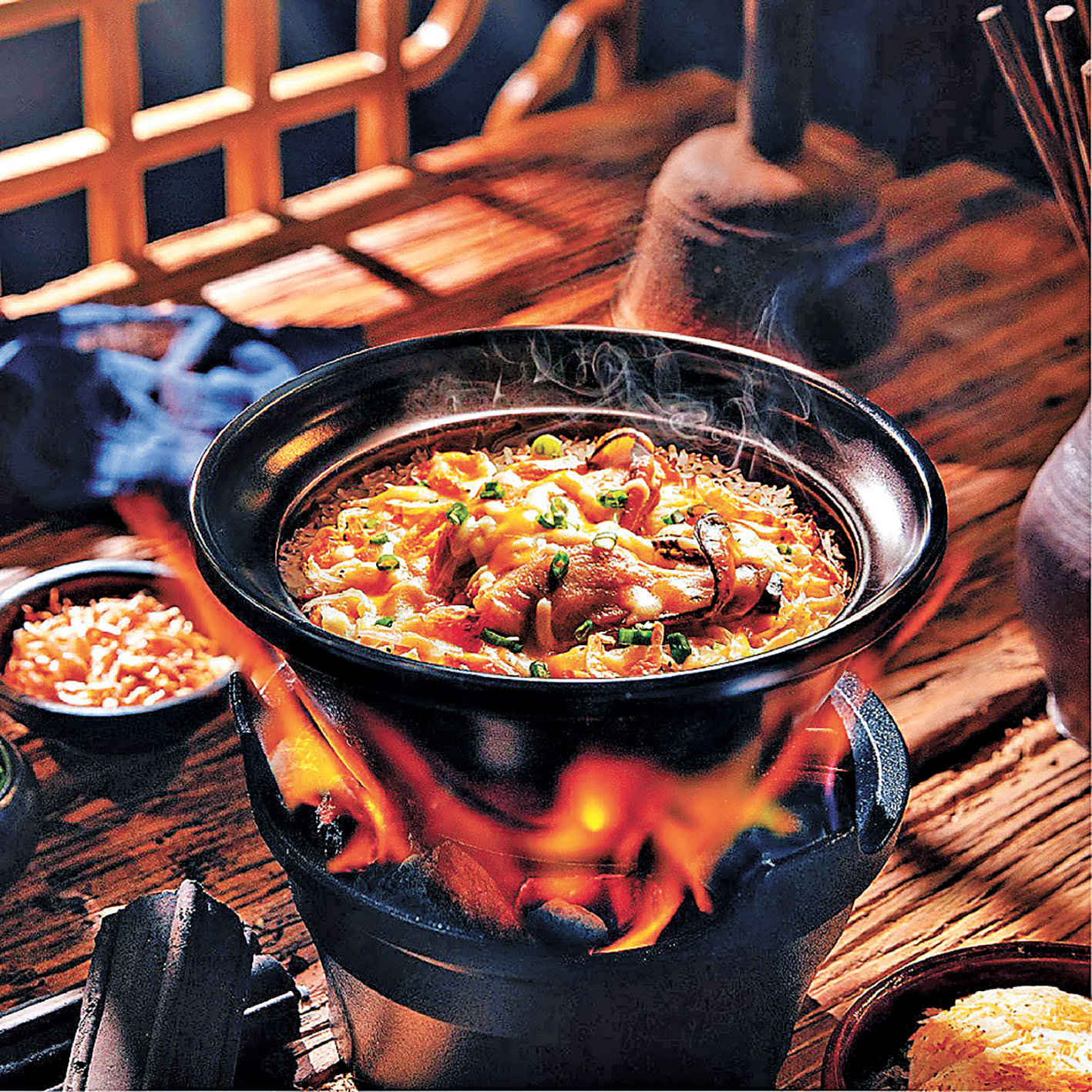 ■「點煲」的芝士櫻花蝦金蠔銀魚煲仔飯。