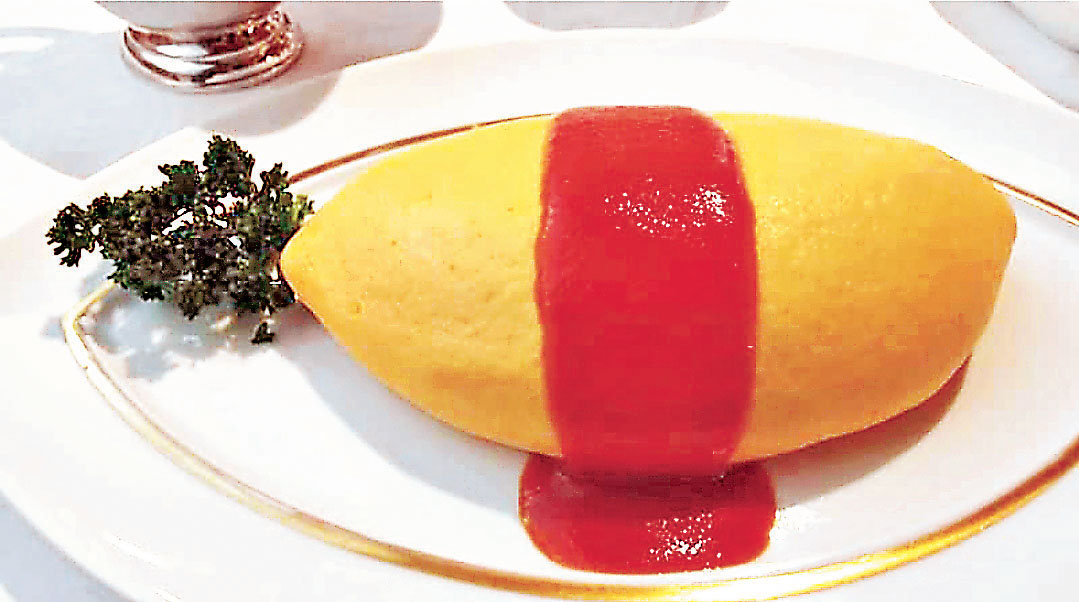 ■資生堂的招牌蛋包飯以半熟蛋包裹着飯。