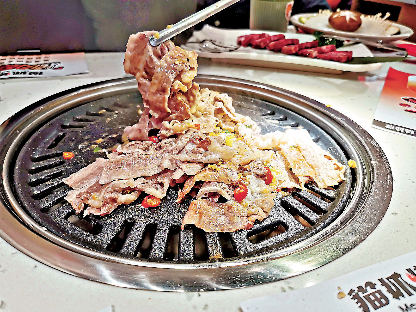 ■店內招牌菜泡椒肥牛肉以非物質文化遺產老罈子泡椒作主調。