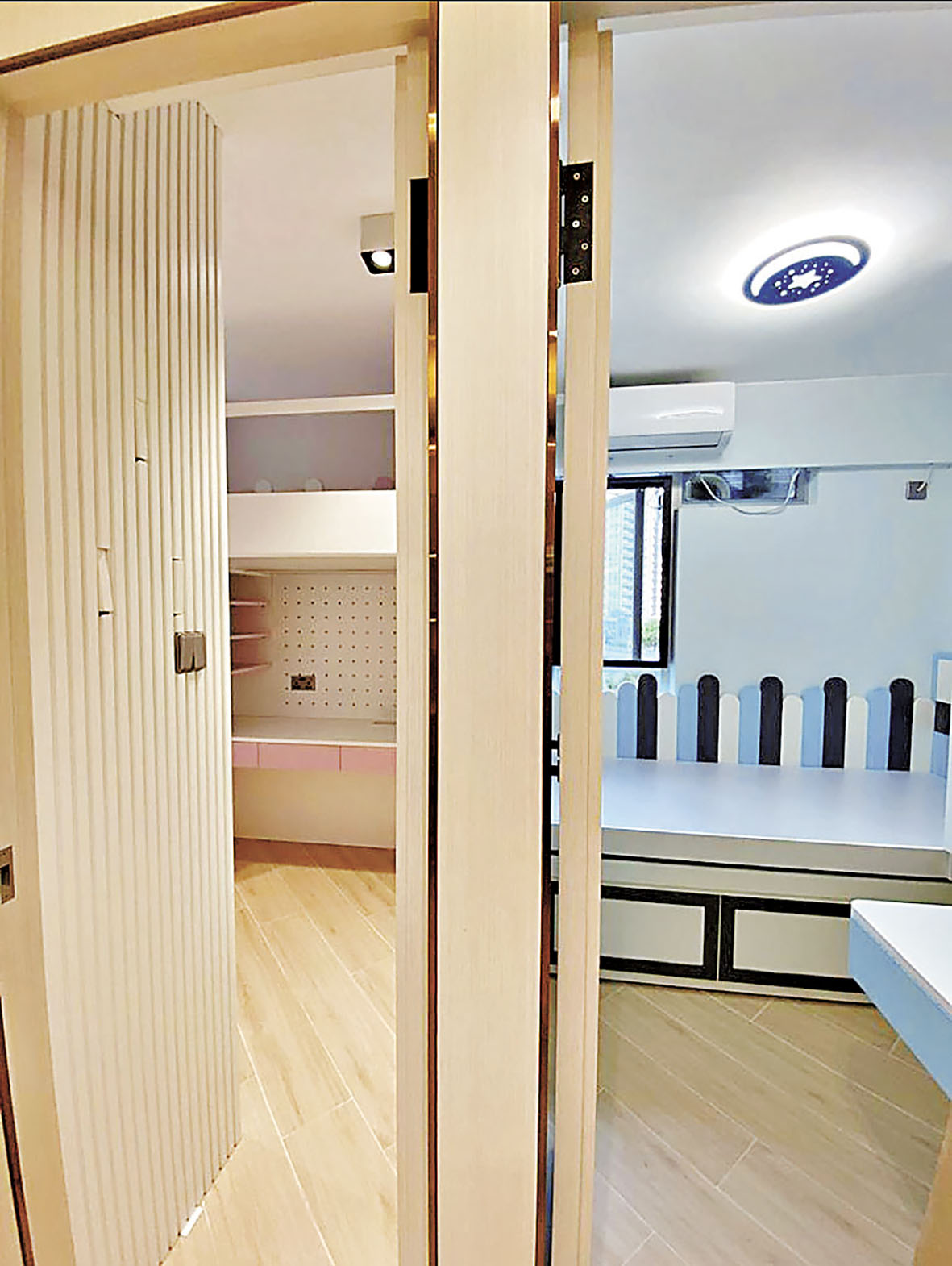 ■相連的仔女睡房均採用木條紋裝飾的暗門。