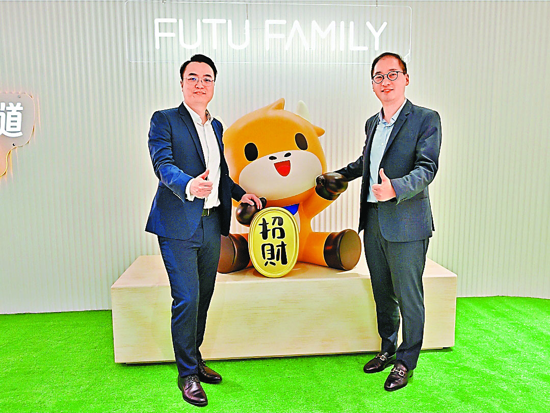 ■富途證券銅鑼灣旗艦店開幕。左為執行董事付凱，右為董事總經理謝志堅。