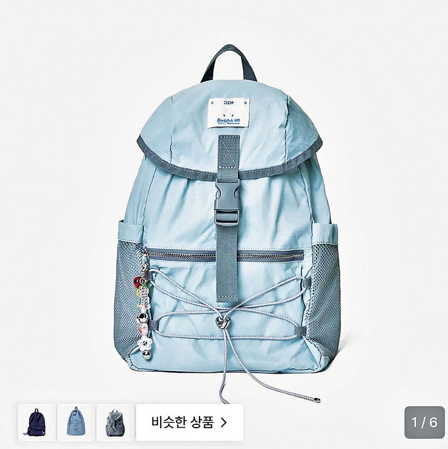 ■淺藍色雙肩包，超有少女心。