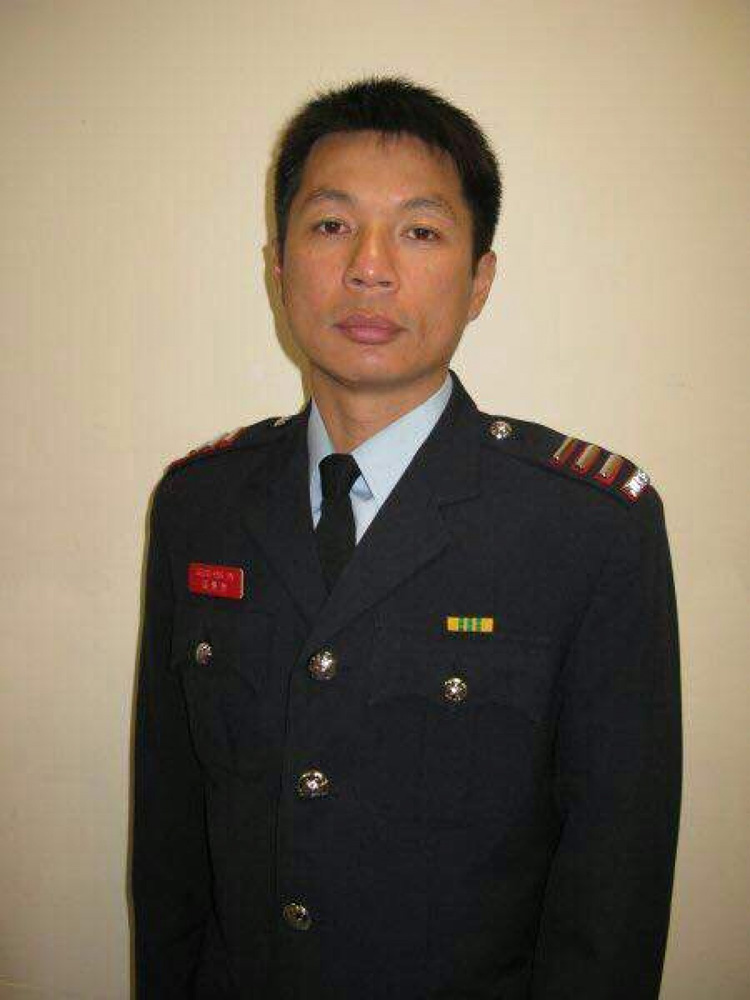 　　圖：消防總隊目邱少明前年在馬鞍山吊手岩拯救行山人士時不幸殉職