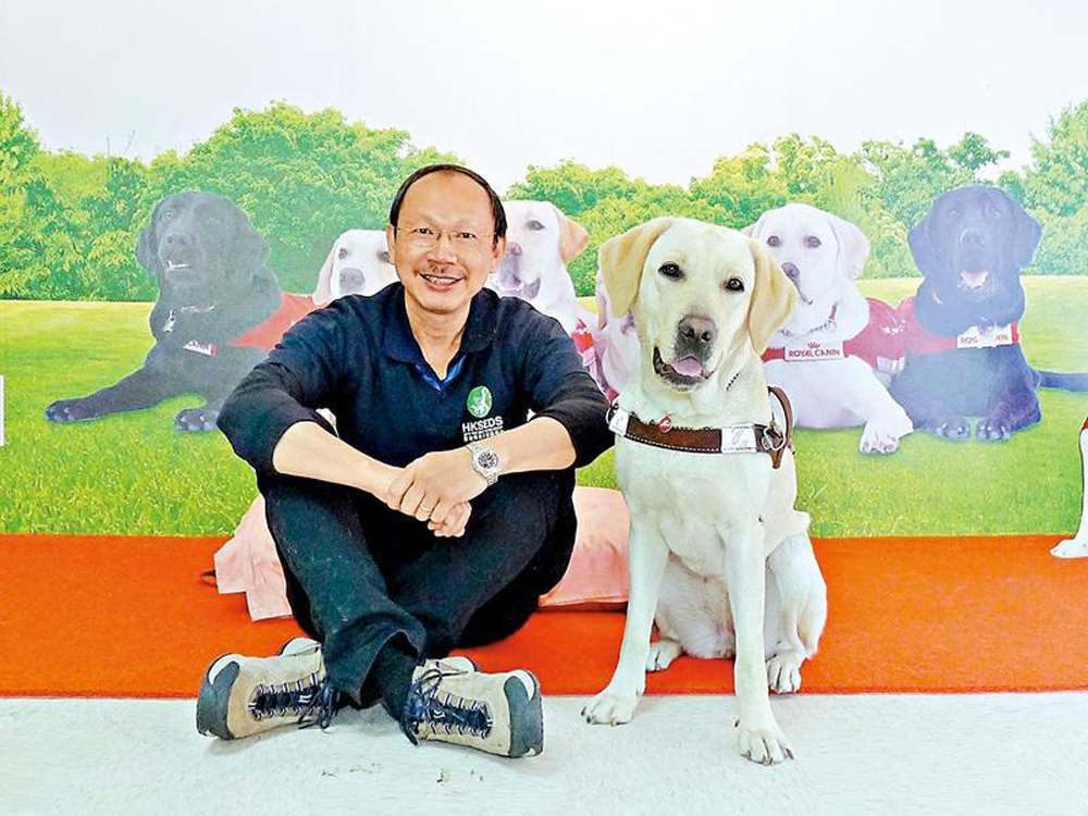 　　圖：張偉民希望政府能助導盲犬服務扎根香港，為更多視障人士提供服務