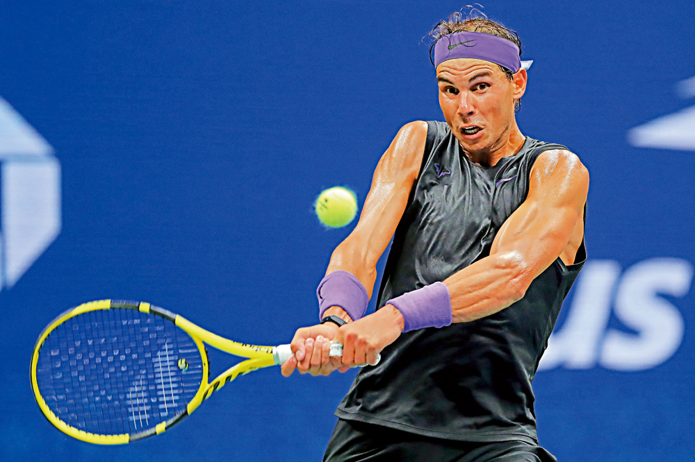 　　圖：拿度反手回球\法新社