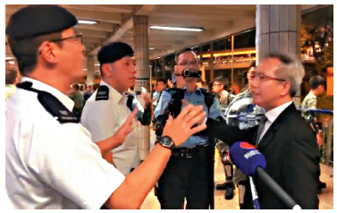 　　圖：陳振哲在「9．28」金鐘暴亂中不斷大呼小叫，叫罵警方，阻礙警方執法