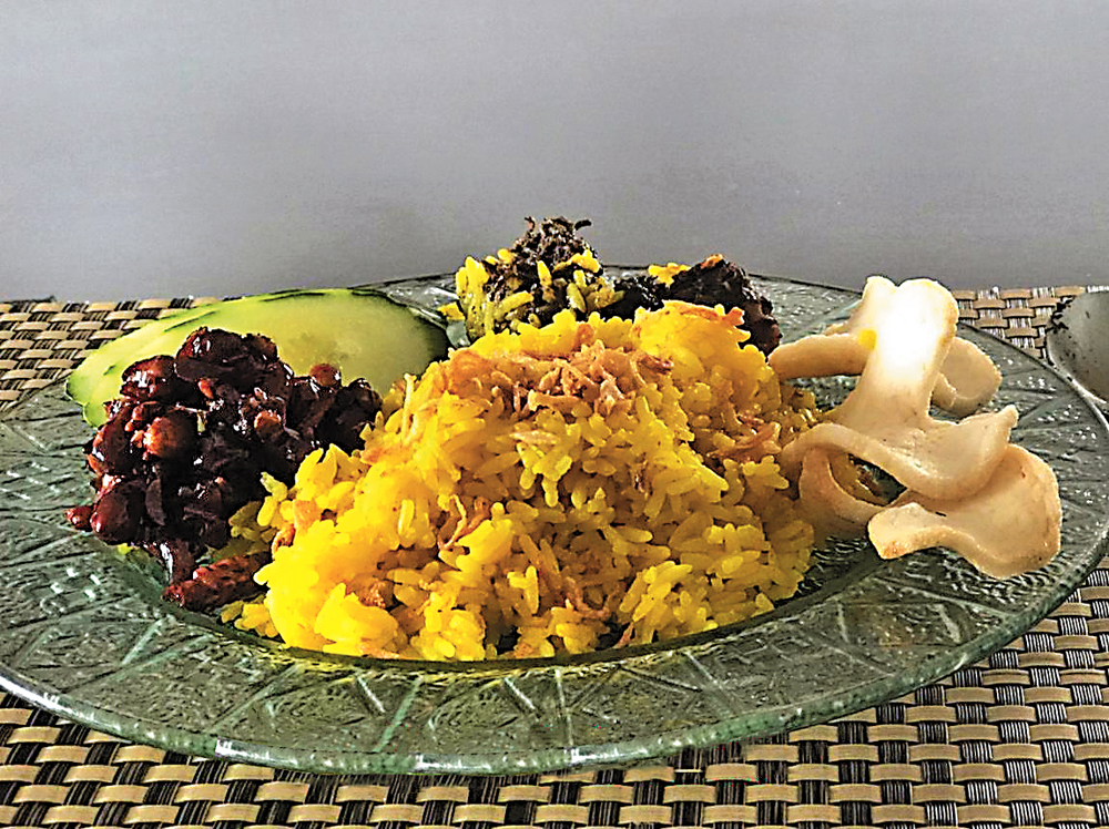 　　圖：黃薑飯是南洋一帶常見的飯食\作者供圖
