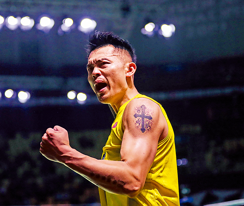 　　圖：林丹在第一局取勝後非常激動\法新社