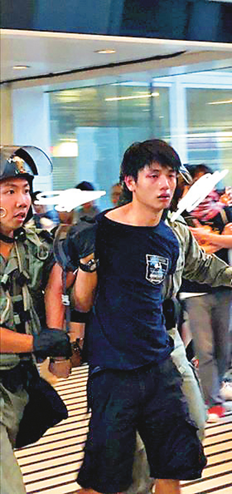 　　圖：律政司就割警員頸一案首度向法庭申請頒令，禁止公開警員身份。圖為案中被告許添力\網上圖片