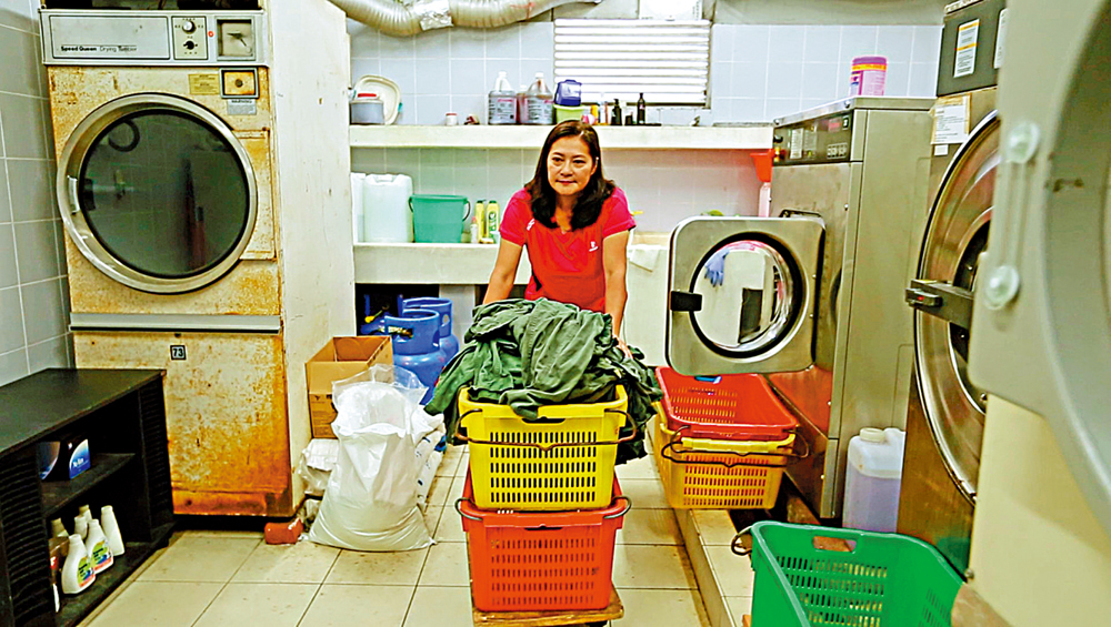 　　圖：洗衣房成本壓力倍增，但鄺太並無加價，與警隊共渡時艱