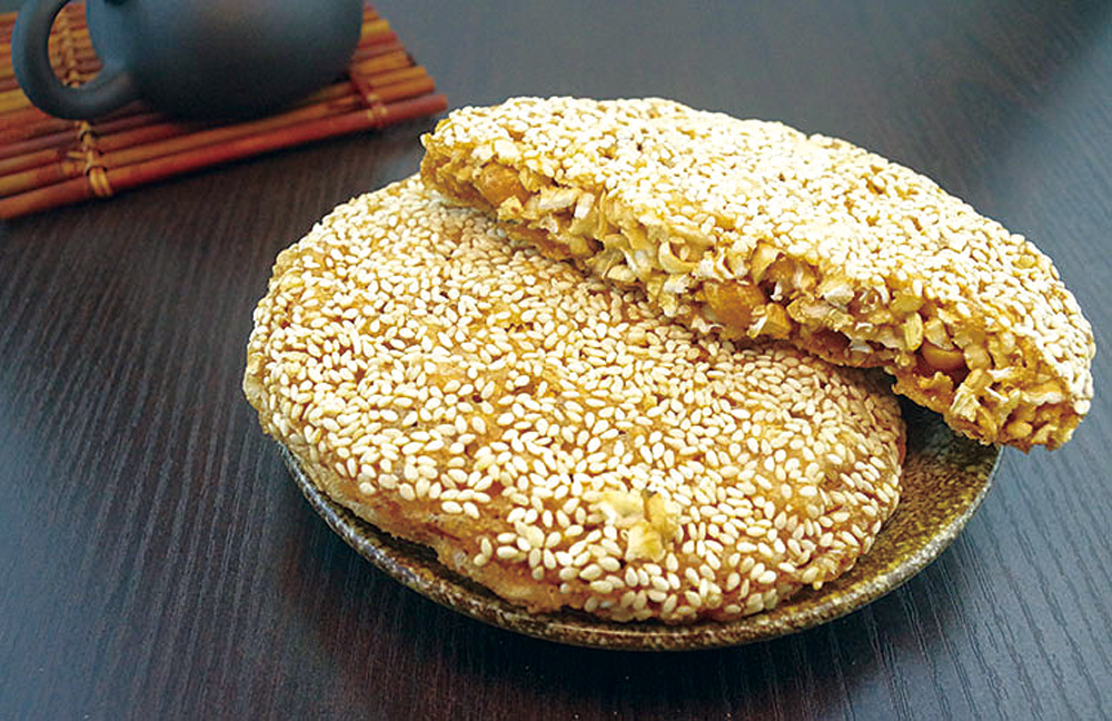 　　圖：九江煎堆是佛山南海賀年食品\資料圖片