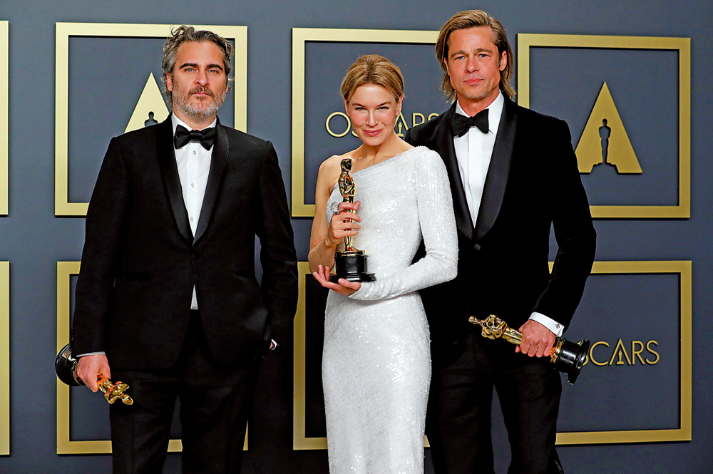 　　圖：（從左至右）第92屆奧斯卡金像獎影帝華堅馮力士、影后雲妮絲維嘉、最佳男配畢彼特\路透社