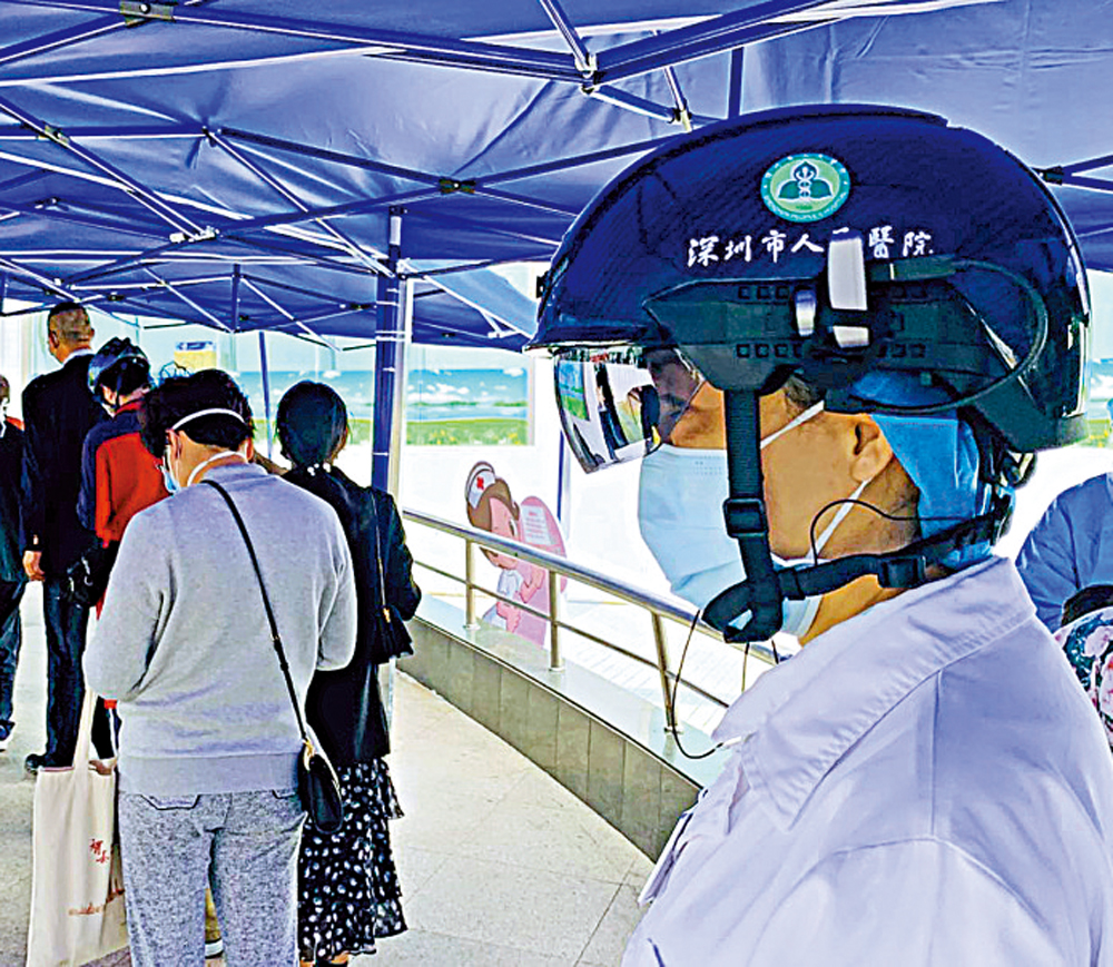 　　圖：智能頭盔一眼掃過完成對前方幾米範圍內所有人員體溫檢測/受訪者供圖