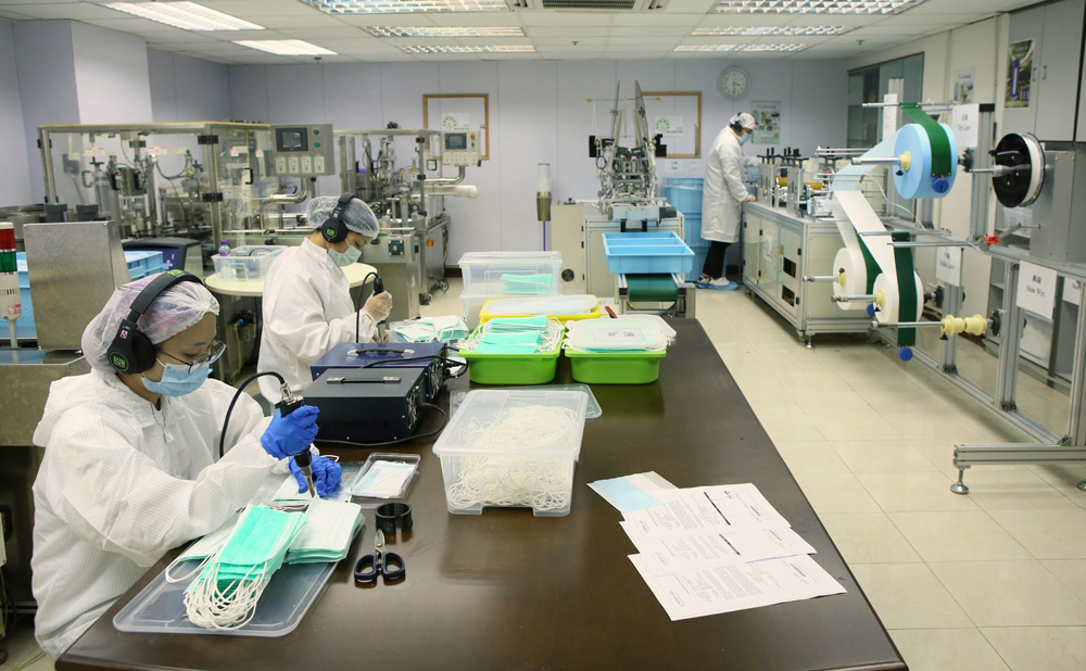 　　圖：本地口罩生產資助計劃已批出八條生產線/資料圖片