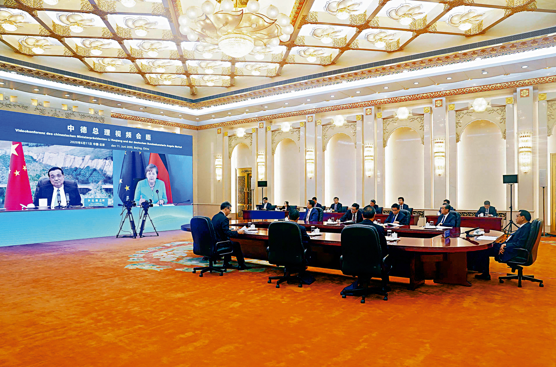 　　圖：6月11日下午，中國國務院總理李克強在人民大會堂同德國總理默克爾舉行視頻會晤\新華社