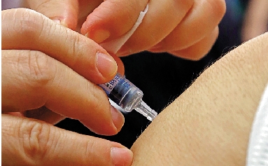 　　圖：接種流感疫苗有助對抗新冠疫情