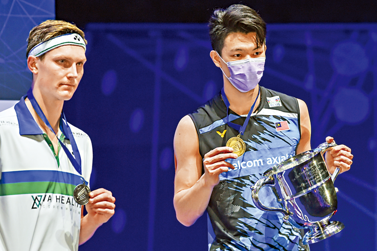 　　圖：李梓嘉（右）勇勝爭取衛冕的安賽龍奪冠。\美聯社