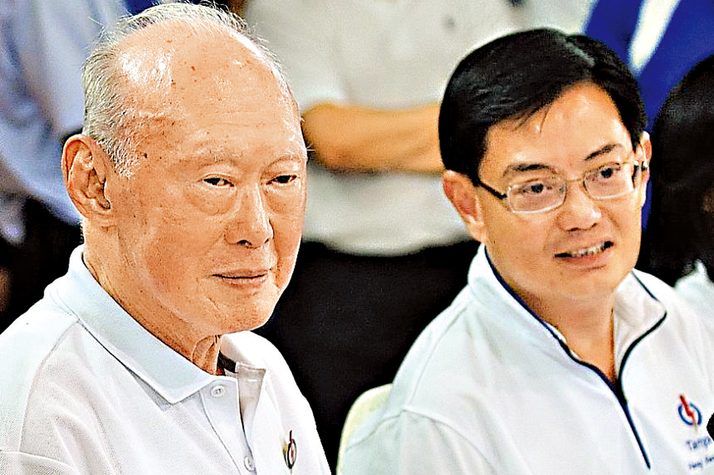 　　圖：新加坡副總理王瑞杰曾任李光耀（左）的私人秘書。\資料圖片