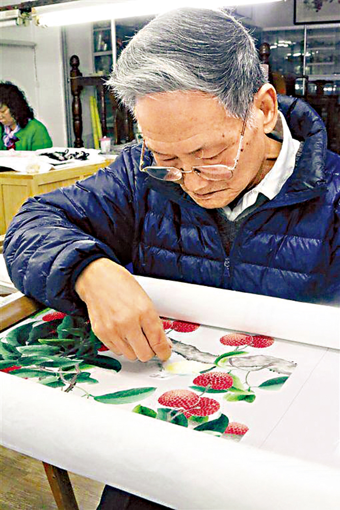 　　圖：廣繡傳承人許熾光。