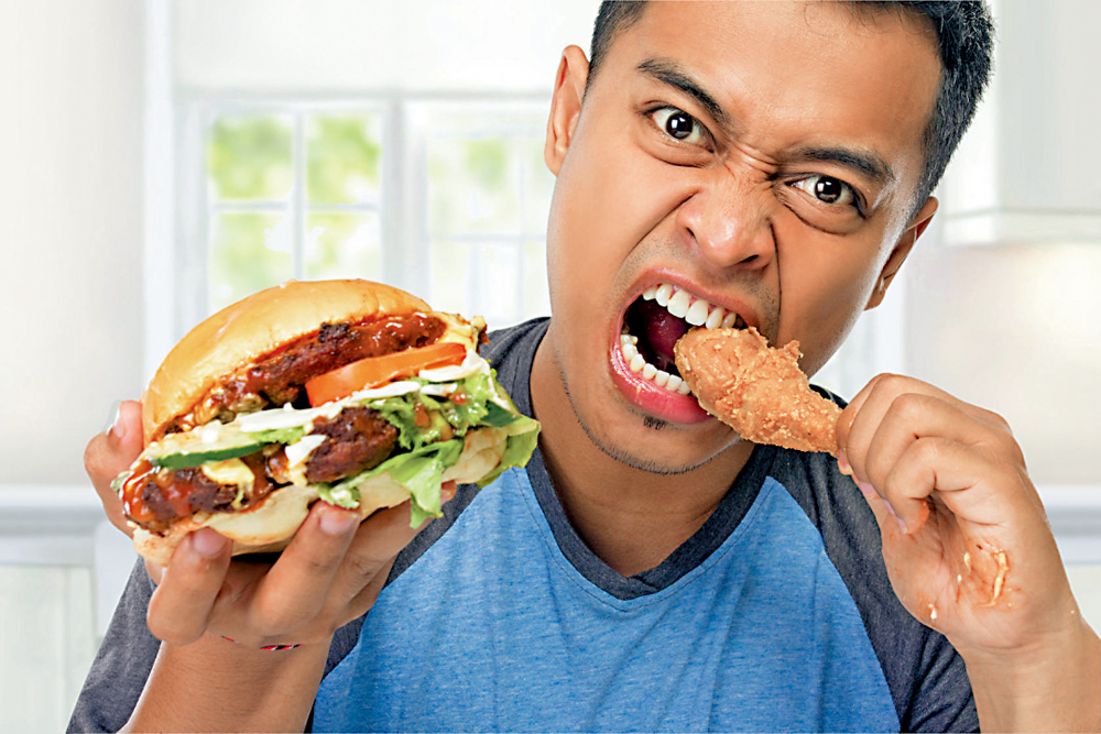 　　圖：飲食不節制是中風年輕化的原因之一。