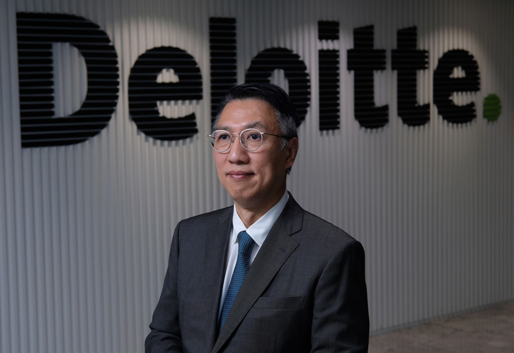 　　圖：周志賢預期大灣區的發展速度有望加快，為專業人士帶來更多業務機會。\大公報記者文澔攝