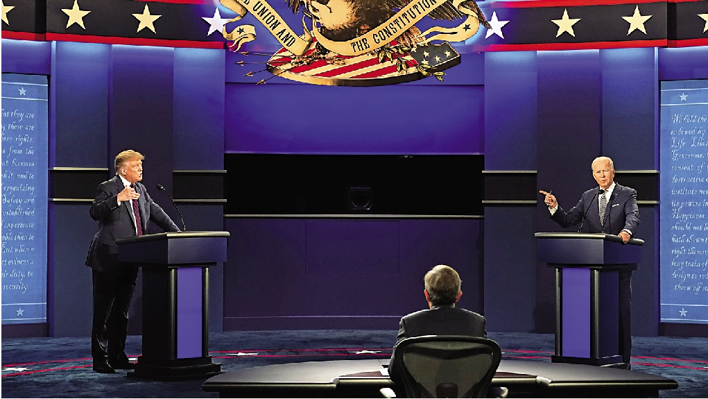 　　圖：去年9月29日，時任美國總統特朗普（左）與民主黨候選人拜登（右）在俄亥俄州進行首場大選辯論。\美聯社