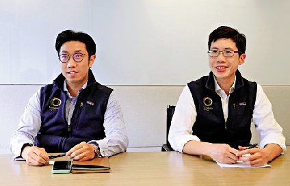 　　圖：恒昱資本董事總經理陳耀基（右）說，大批內房債即將到期，估計首季之前，市場信心持續惡化。旁為黃殷。\大公報記者何嘉駿攝