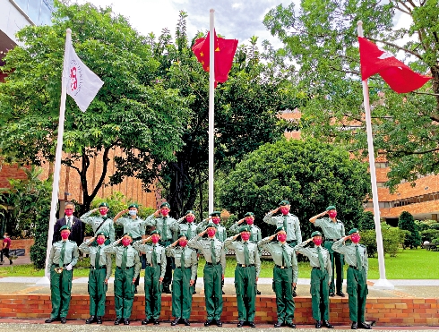 圖：香港理工大學七一升旗隊來自香港青少年軍總會，而理大四年級學生吳文慧擔任此次升旗隊的指揮員。
