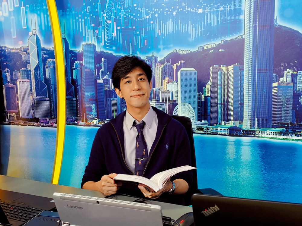 　　圖：陳家偉認為，透過節目介紹書籍，是寓工作於娛樂。\大公報攝