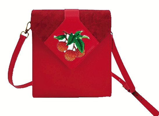 　　圖：林俊億製作的繡花皮具。