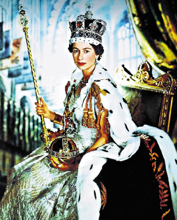 　　圖：伊麗莎白二世在加冕禮上頭戴帝國皇冠，手持君主權杖，上面鑲嵌的巨大鑽石來自南非。\網絡圖片