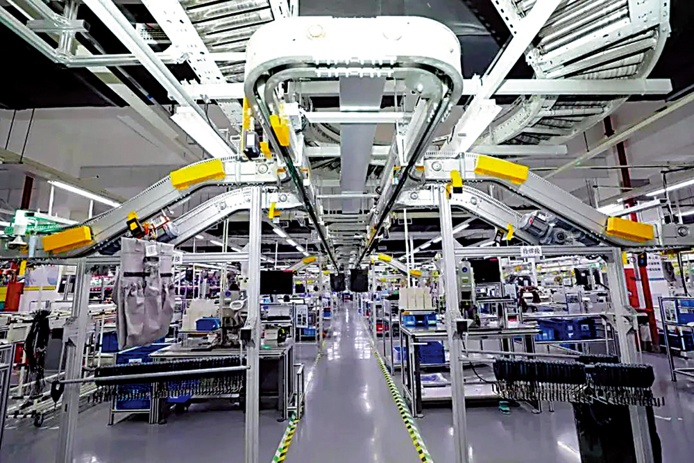 　　圖：昆山一家台資企業實現智能化生產後，大大減少人力成本。