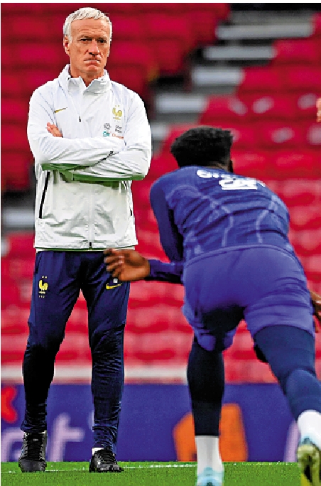 　　圖：迪甘斯（左）可能在世盃後離任。\資料圖片