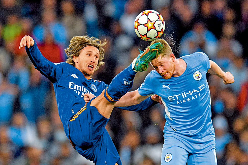 　　圖：莫迪歷（左）與迪布尼曾在上屆歐聯四強交手。\資料圖片