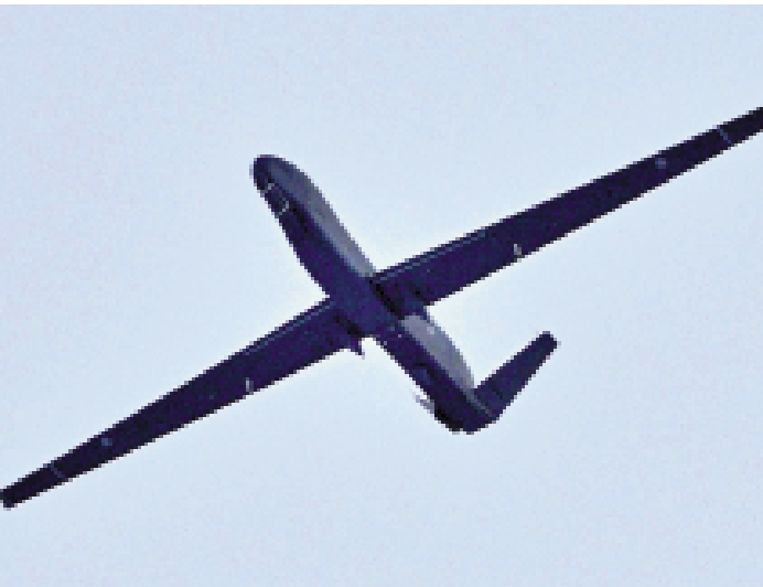 　　圖：日本航空自衛隊12月21日首次正式試飛了第一架新型「全球鷹」。