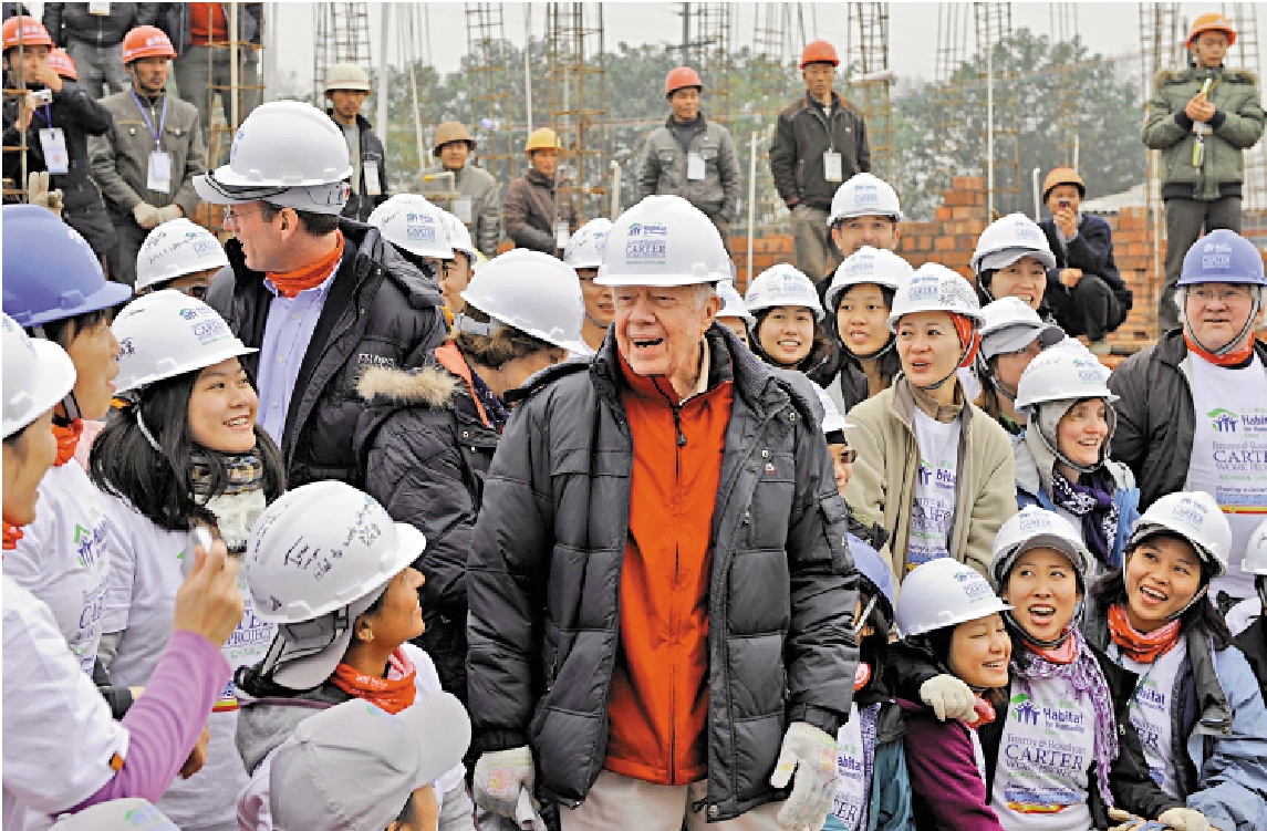 　　圖：卡特卸任後多次訪華，圖為他2009年到訪中國四川省。/資料圖片