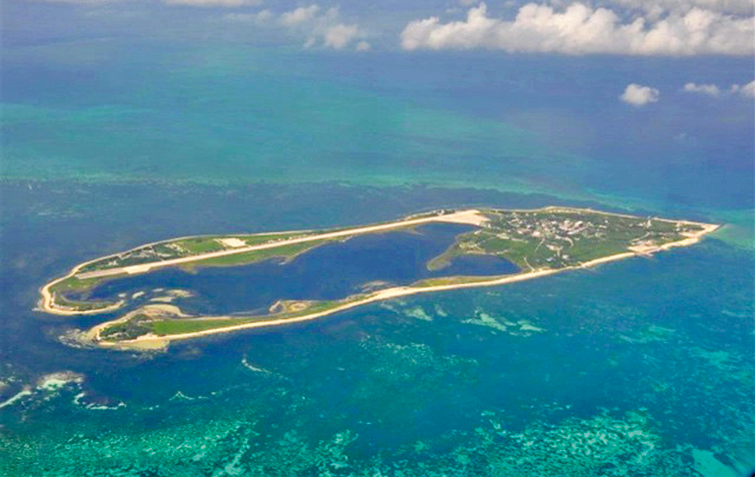 　　圖：東沙島作為我國在南海的領土，歷來有廣東、福建漁民在這裏捕魚、趕海，島上更有漁民搭建的倉儲設施及神廟。