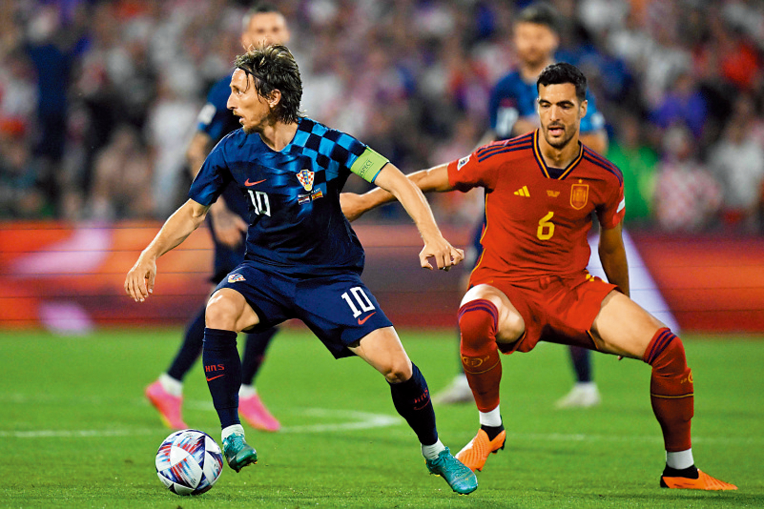 　　圖：莫迪歷（左）對退出國家隊與否仍未有答案。\法新社