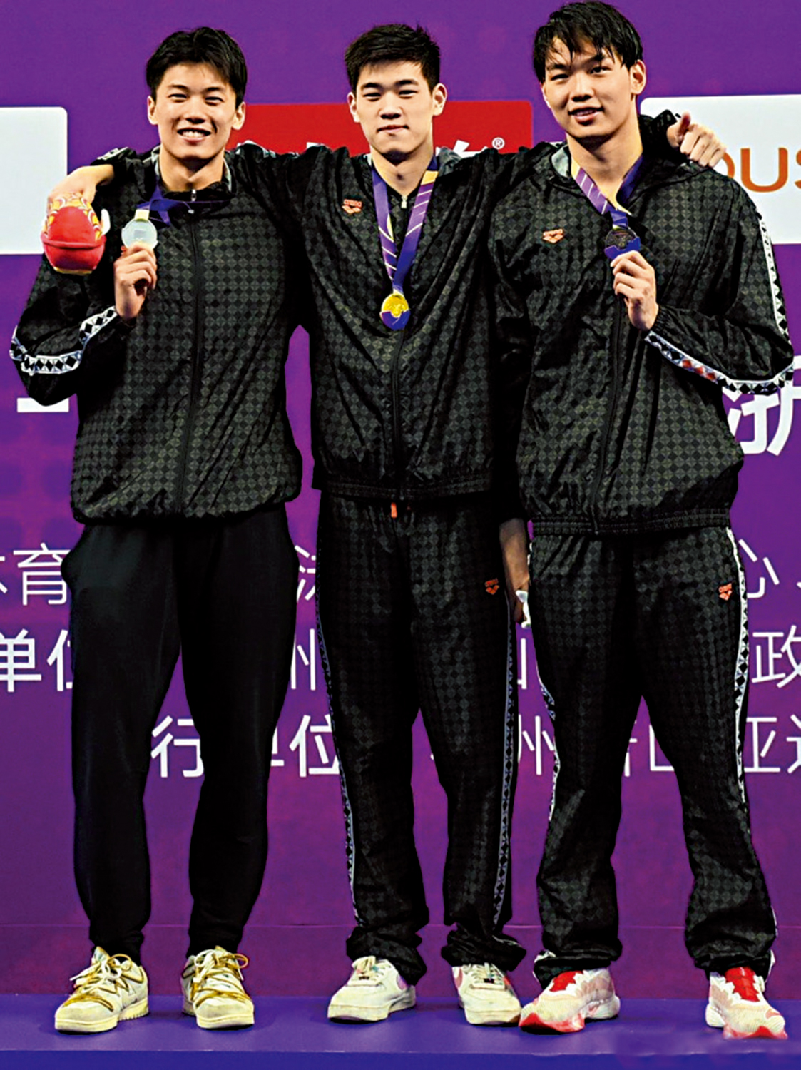 　　圖：潘展樂（中）在今年全國冠軍賽男子200米自由泳摘冠。