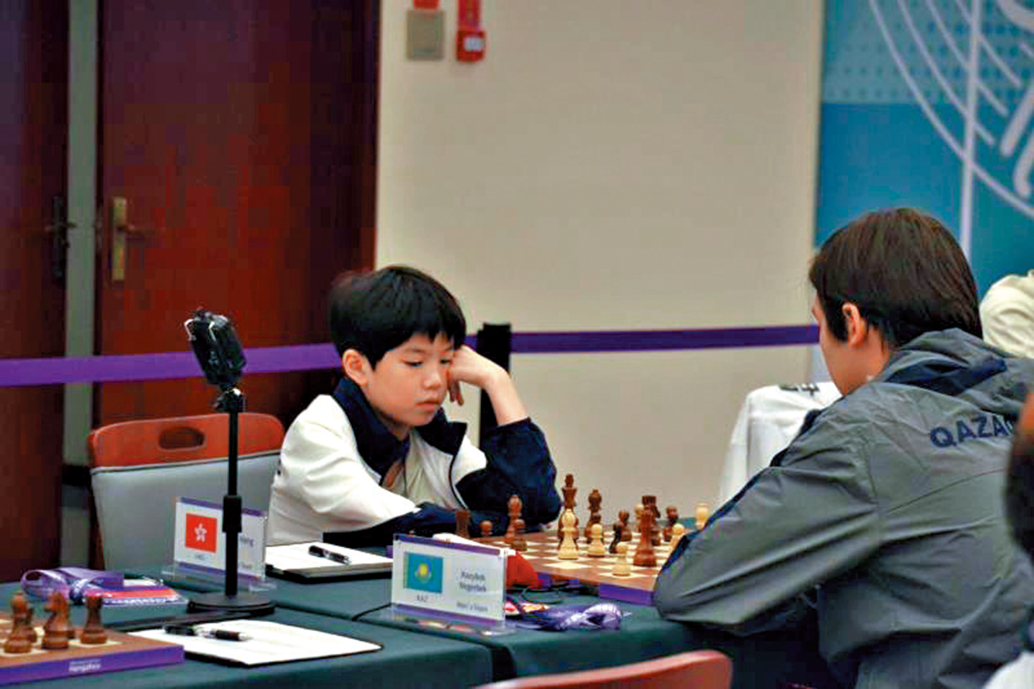 　　圖：年僅11歲的港隊男棋手李奕衡。